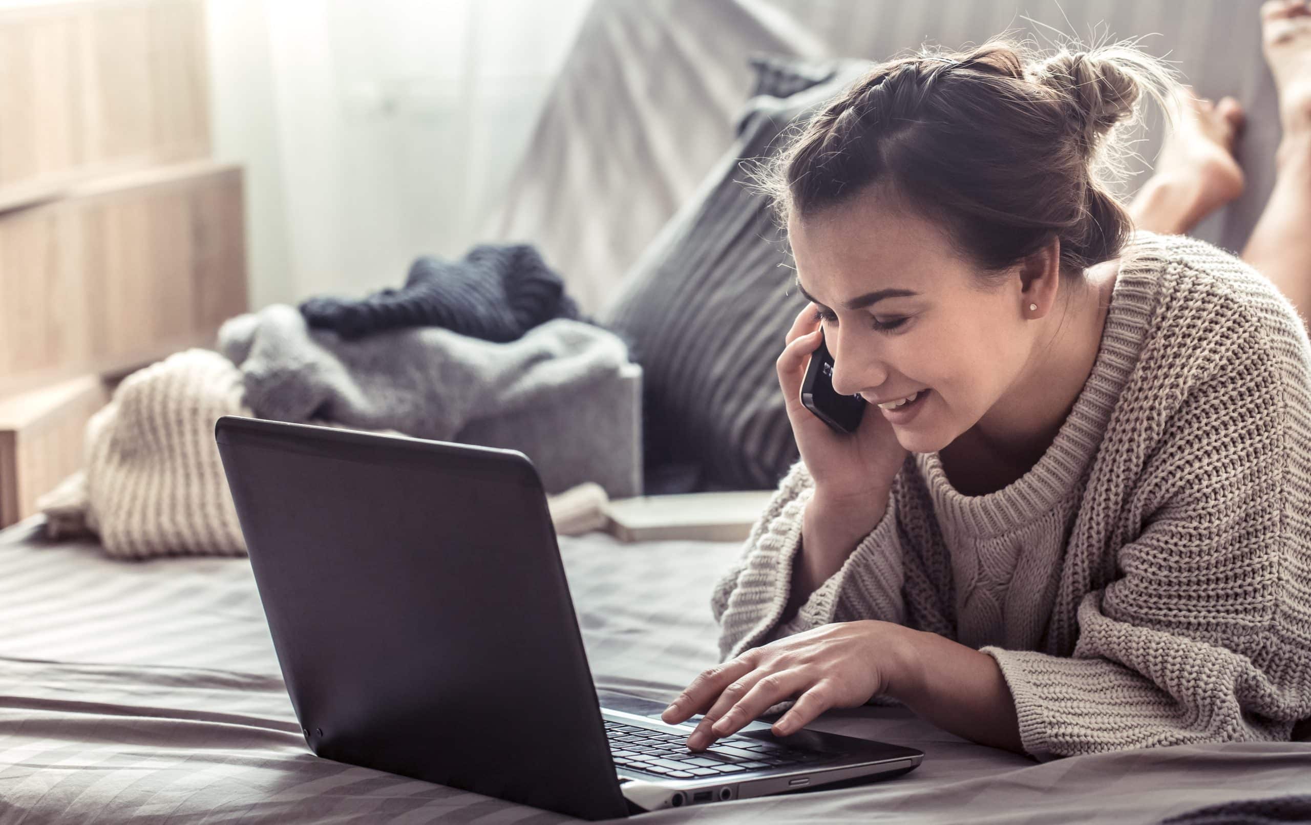 Girl at home at computer, concept of work at home, education