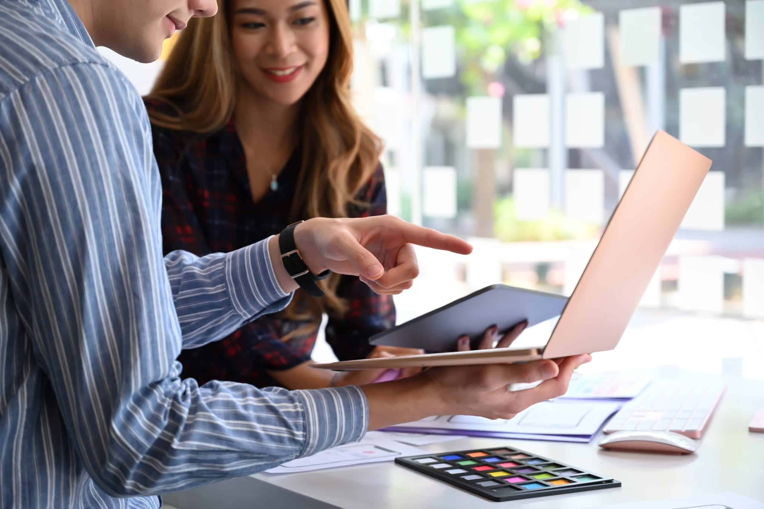 Team of graphic designer planning application process development prototype wireframe for web mobile phone. User experience concept.